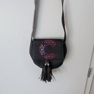 Justice crossbody purse / bag  black with tassel